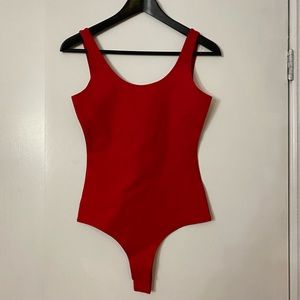 Sexy red bodysuit in size small. Brand new with tags.